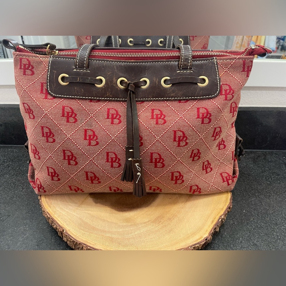 preloved Red tassel Dooney & Bourke